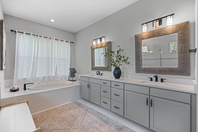 bathroom with tile patterned flooring, vanity, and plus walk in shower