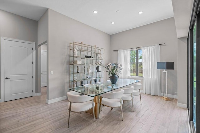 dining area with light hardwood / wood-style flooring