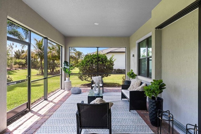 sunroom featuring plenty of natural light