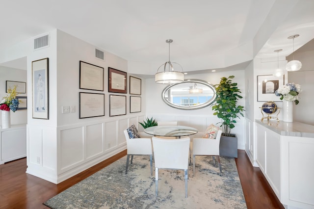 dining room featuring dark hardwood / wood-style floors