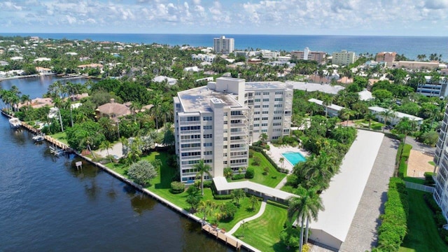 birds eye view of property featuring a water view