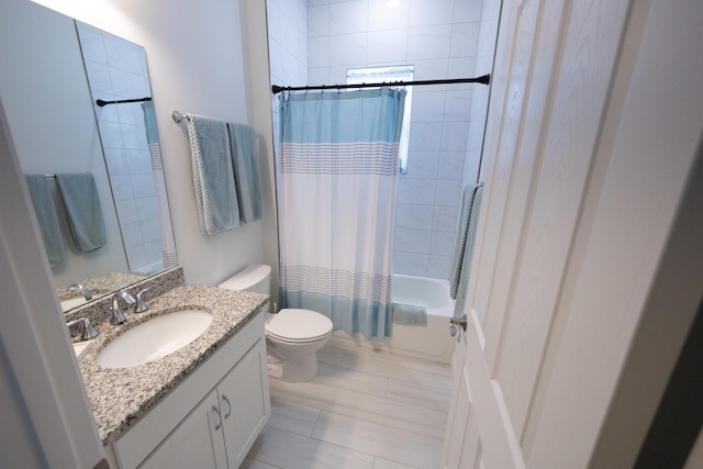 full bathroom featuring vanity, toilet, and shower / bathtub combination with curtain