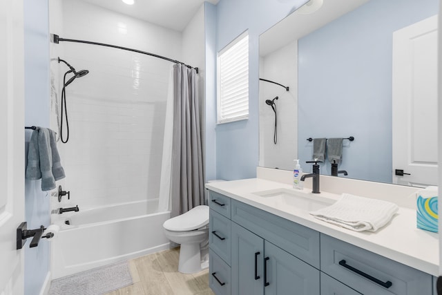 full bathroom with toilet, shower / bath combo, vanity, and hardwood / wood-style flooring