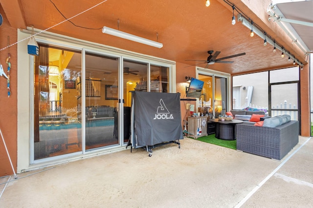 view of patio featuring outdoor lounge area and ceiling fan