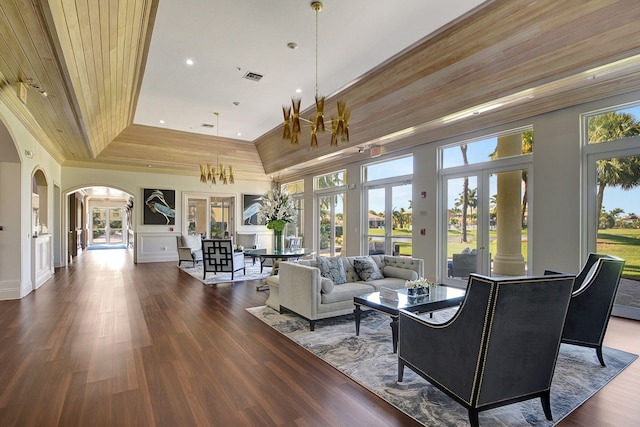 living room featuring french doors and plenty of natural light