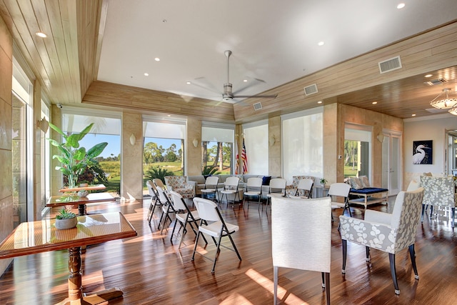 dining space featuring dark hardwood / wood-style flooring, a wealth of natural light, and ceiling fan