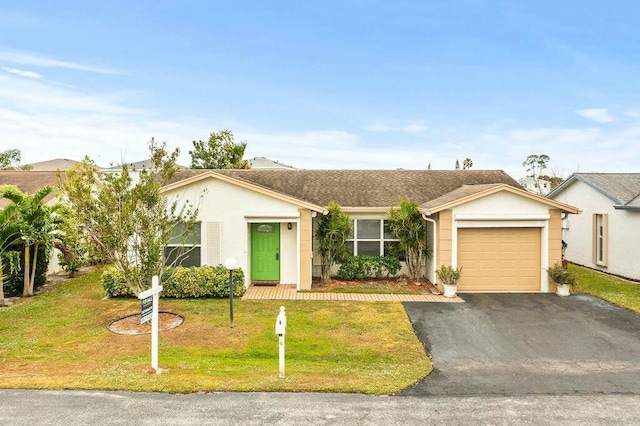 ranch-style house with a front lawn and a garage