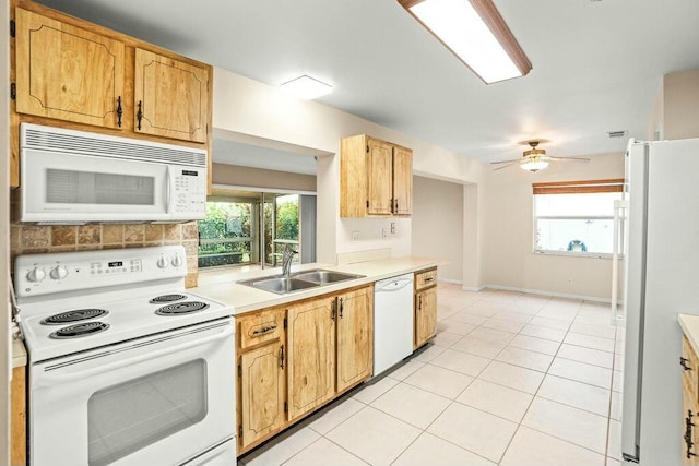 kitchen featuring ceiling fan, white appliances, sink, and light tile patterned floors