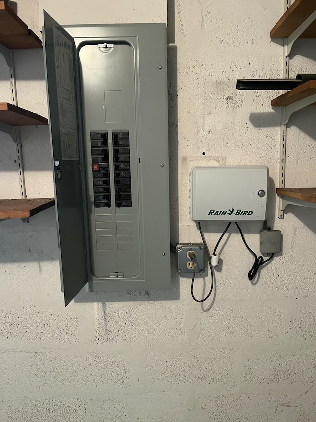 utility room featuring electric panel