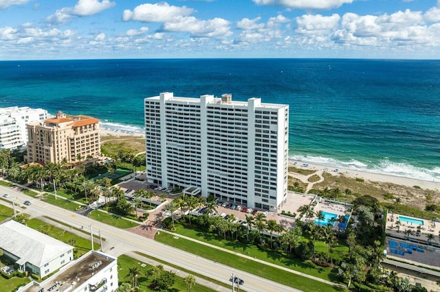 aerial view featuring a water view and a beach view