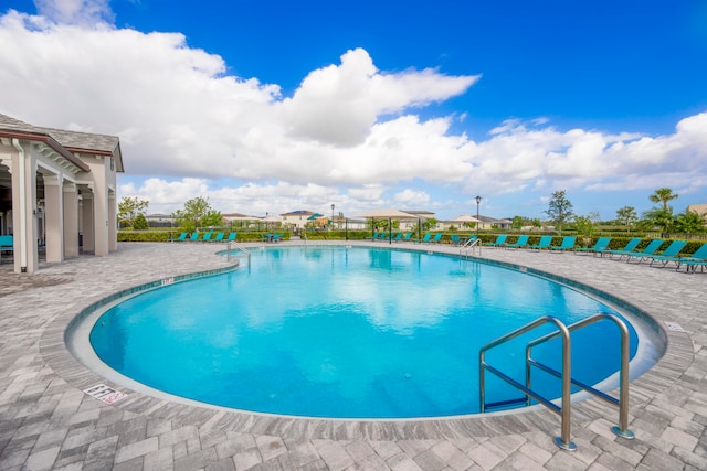 view of pool featuring a patio area