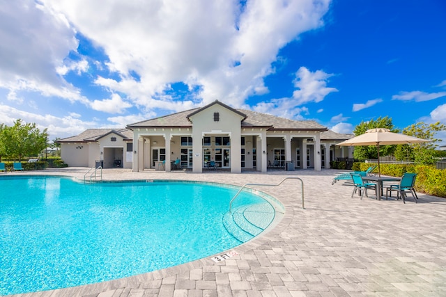 view of pool featuring a patio area