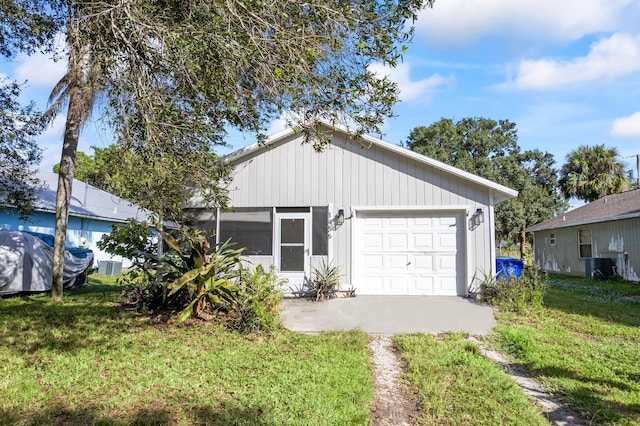 garage with a yard