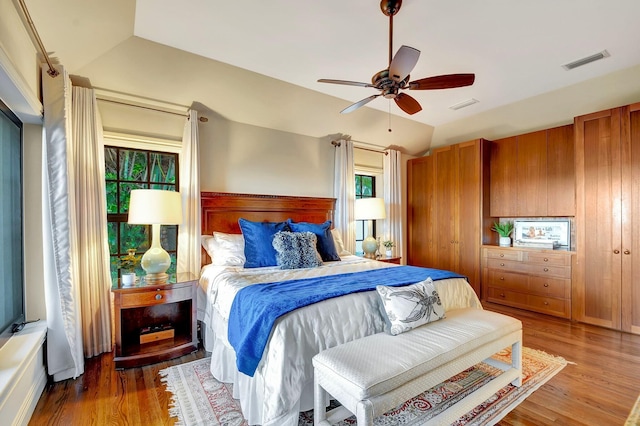 bedroom featuring wood-type flooring and ceiling fan