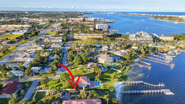 birds eye view of property featuring a water view