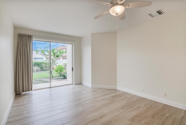 unfurnished room featuring ceiling fan and light hardwood / wood-style floors