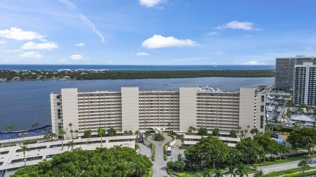 birds eye view of property featuring a water view