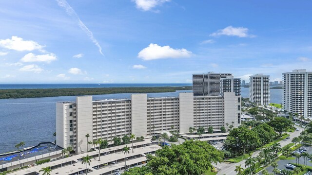 birds eye view of property featuring a water view