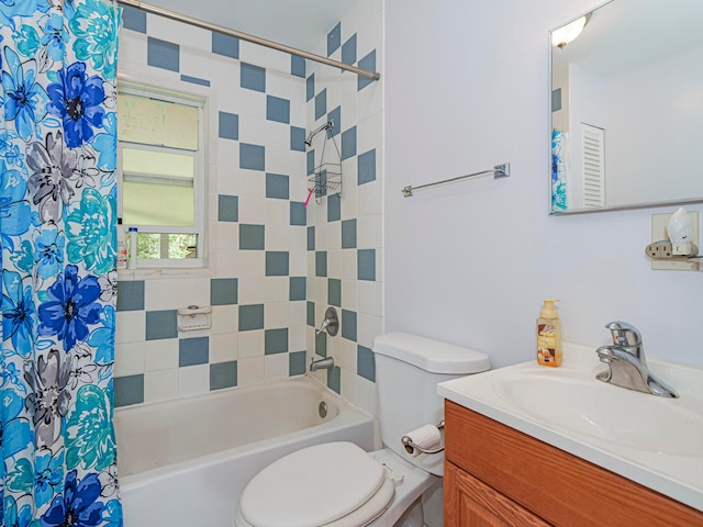 full bathroom featuring shower / bath combo, vanity, and toilet