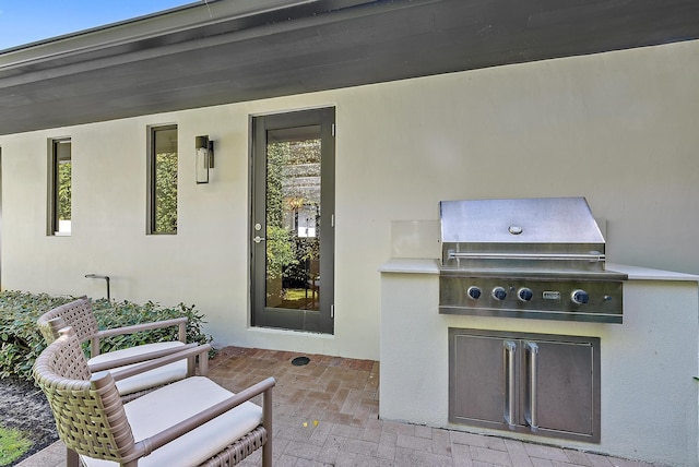 view of patio with a grill