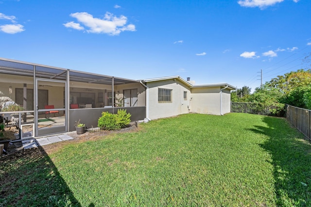 view of yard featuring a lanai