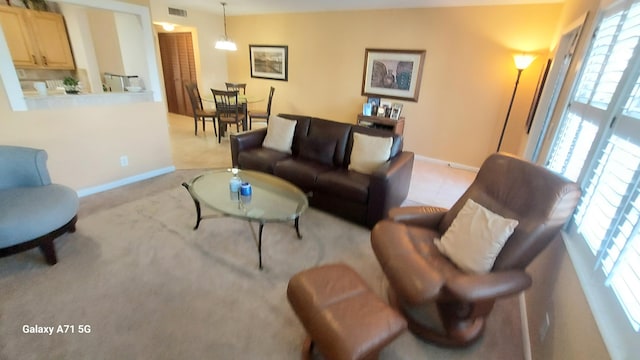 living room featuring plenty of natural light