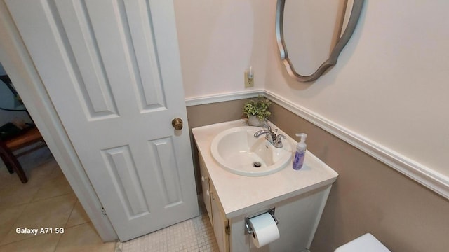 bathroom with vanity and tile patterned flooring