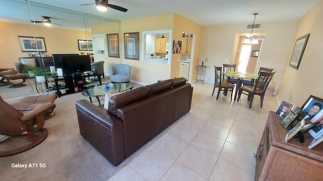 living room with ceiling fan