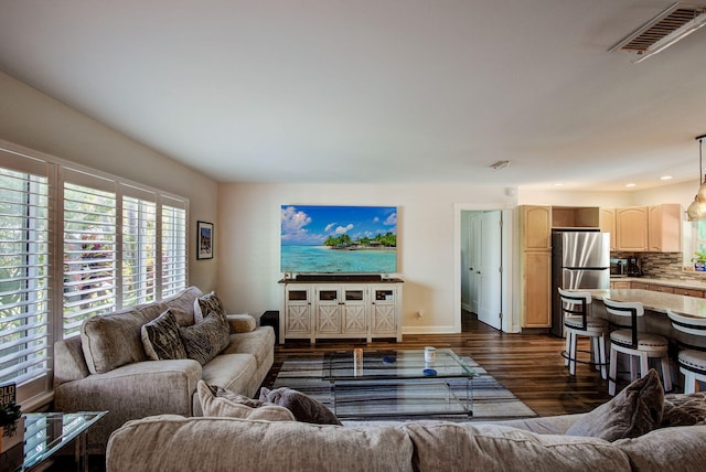 living room with dark wood-type flooring