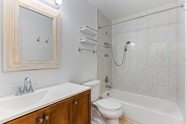 full bathroom with vanity, toilet, and tiled shower / bath combo