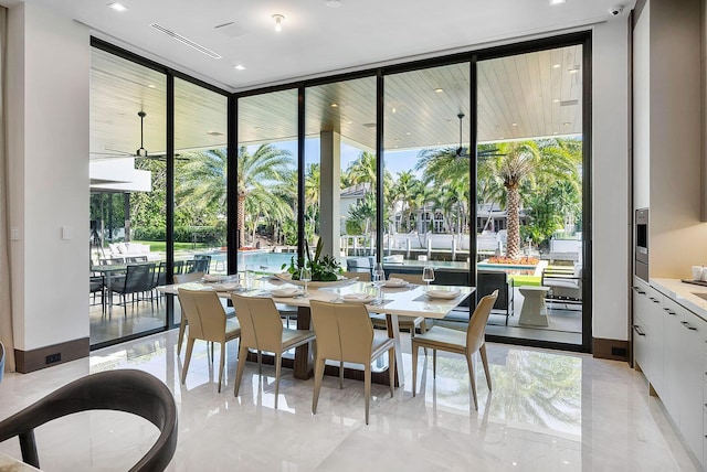 298 W Key Palm Rd, Boca Raton, FL 33432 - dining room with floor to ceiling windows