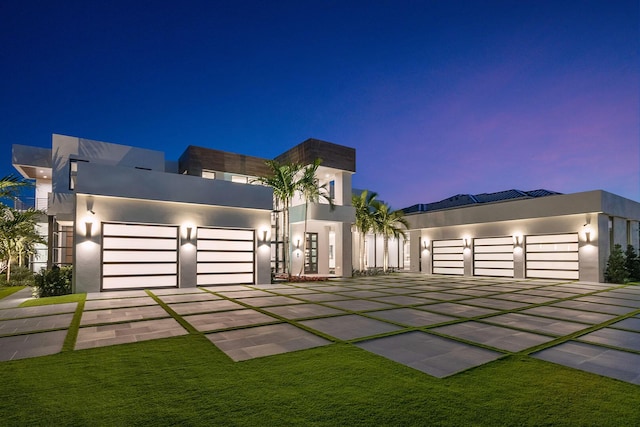 298 W Key Palm Rd, Boca Raton, FL 33432 - view of front facade featuring stucco siding and an attached garage