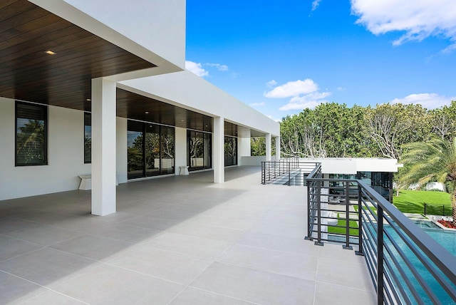298 W Key Palm Rd, Boca Raton, FL 33432 - view of patio / terrace with an outdoor pool