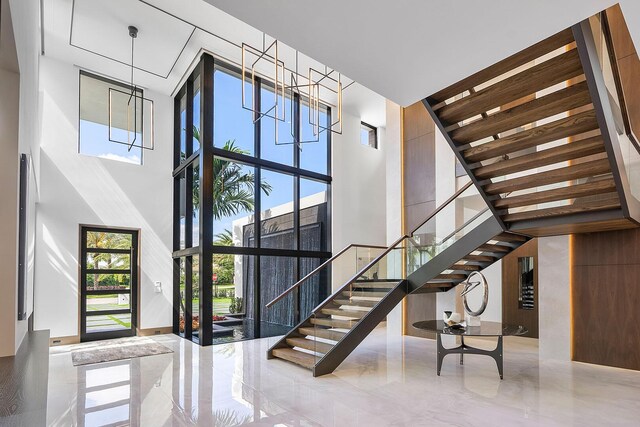 298 W Key Palm Rd, Boca Raton, FL 33432 - foyer with a towering ceiling and stairway
