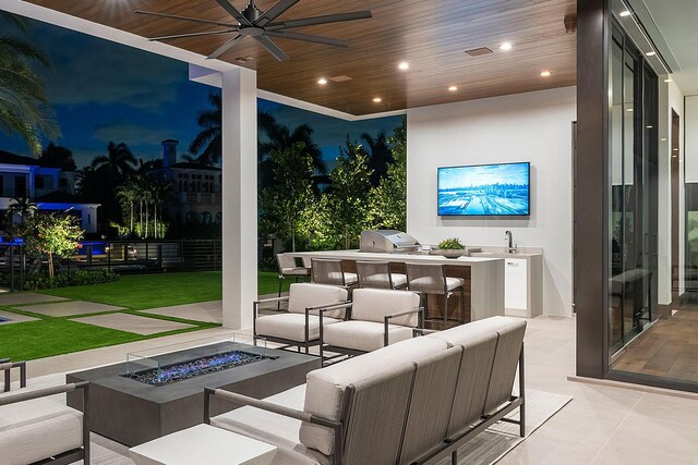 298 W Key Palm Rd, Boca Raton, FL 33432 - view of patio / terrace featuring a ceiling fan and an outdoor living space with a fire pit