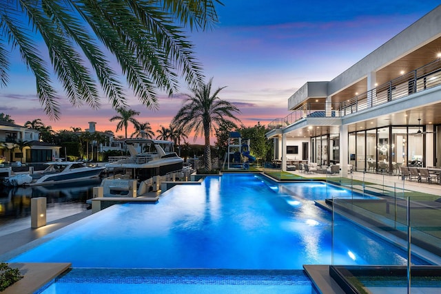 298 W Key Palm Rd, Boca Raton, FL 33432 - view of pool with a pool with connected hot tub and a patio area