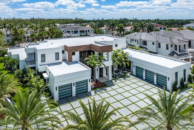 rear view of property with a water view