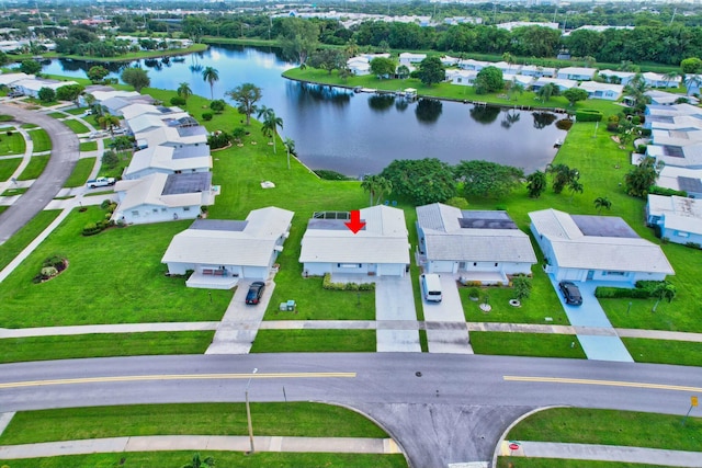 drone / aerial view with a water view