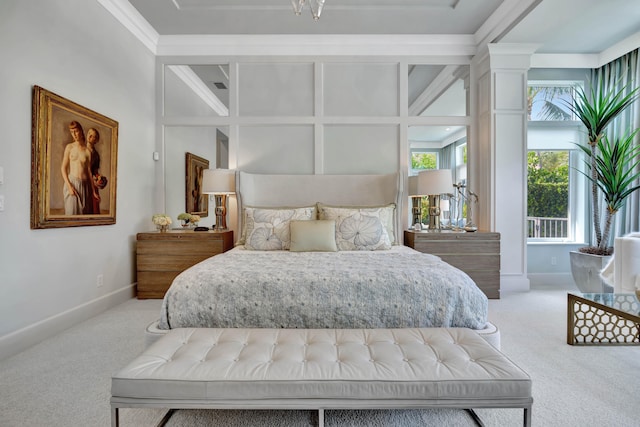 bedroom with carpet, crown molding, and decorative columns