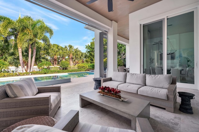 view of patio featuring an outdoor living space and ceiling fan