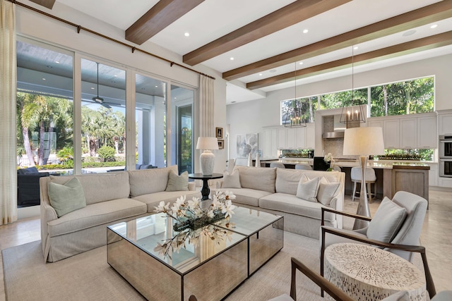 tiled living room with beamed ceiling and ceiling fan