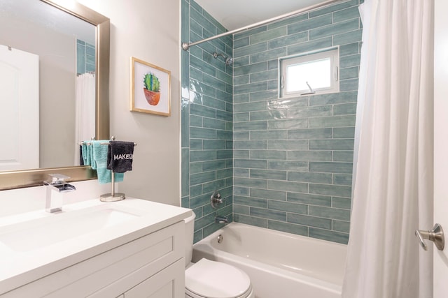 full bathroom featuring vanity, shower / tub combo, and toilet