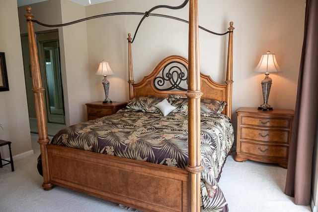 bedroom with light colored carpet