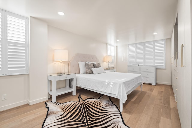 bedroom featuring light wood-type flooring