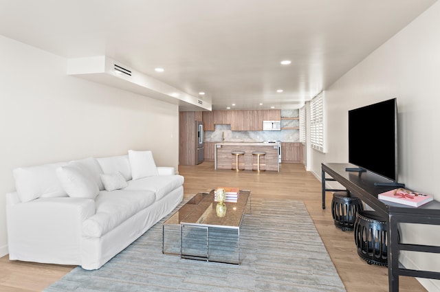 living room featuring light hardwood / wood-style flooring