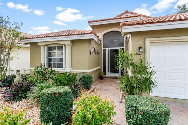 property entrance with a garage