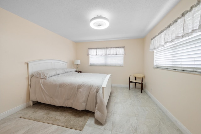 bedroom with a textured ceiling