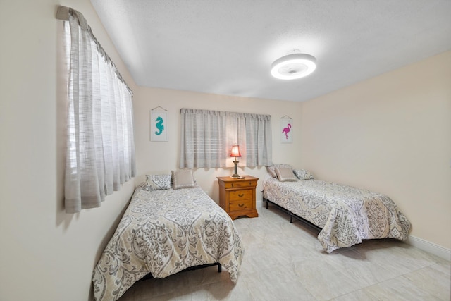 bedroom with a textured ceiling