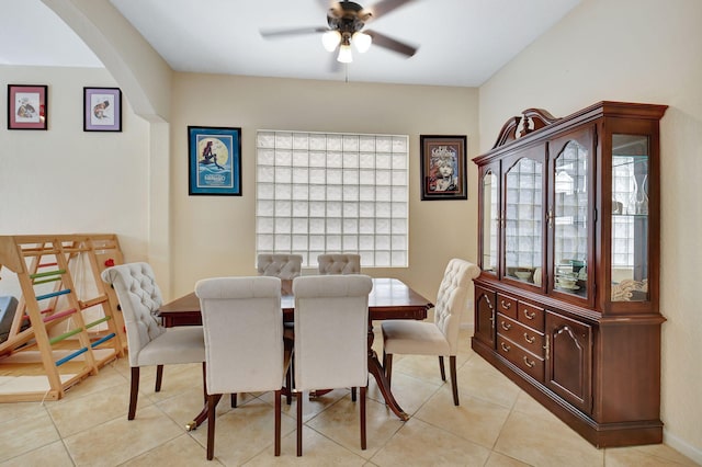 dining area featuring ceiling fan and light tile patterned floors