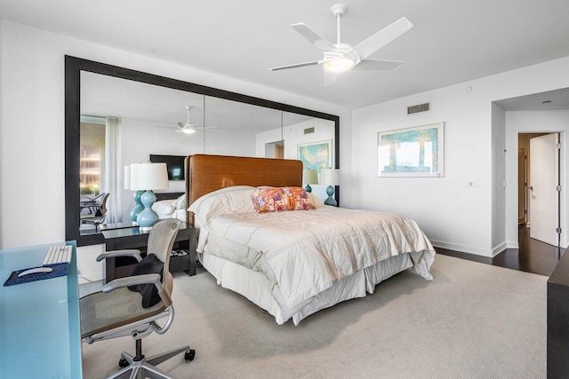 bedroom featuring wood-type flooring and ceiling fan